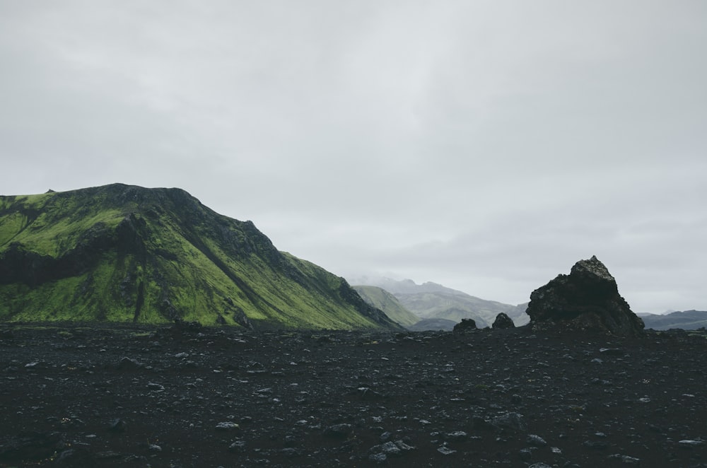 green mountains under white sky during daytime