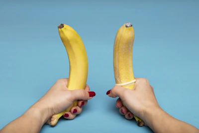 person holding yellow banana fruit