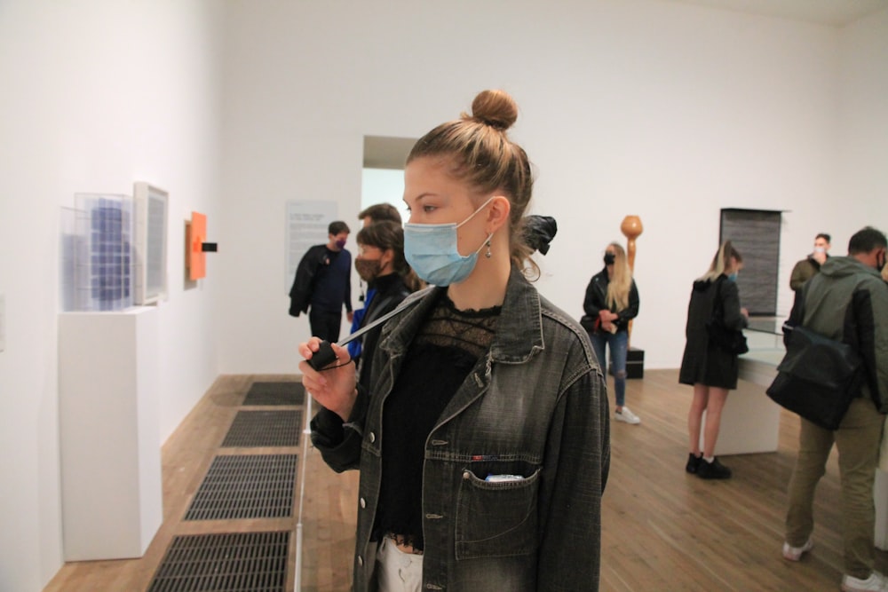 woman in black leather jacket standing beside woman in black leather jacket