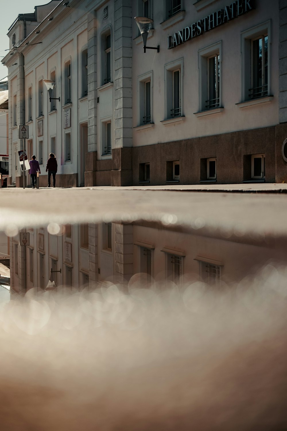 people walking on street near building during daytime