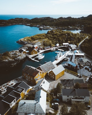 A panoramic view of a coastal Sardinian village with traditional houses.