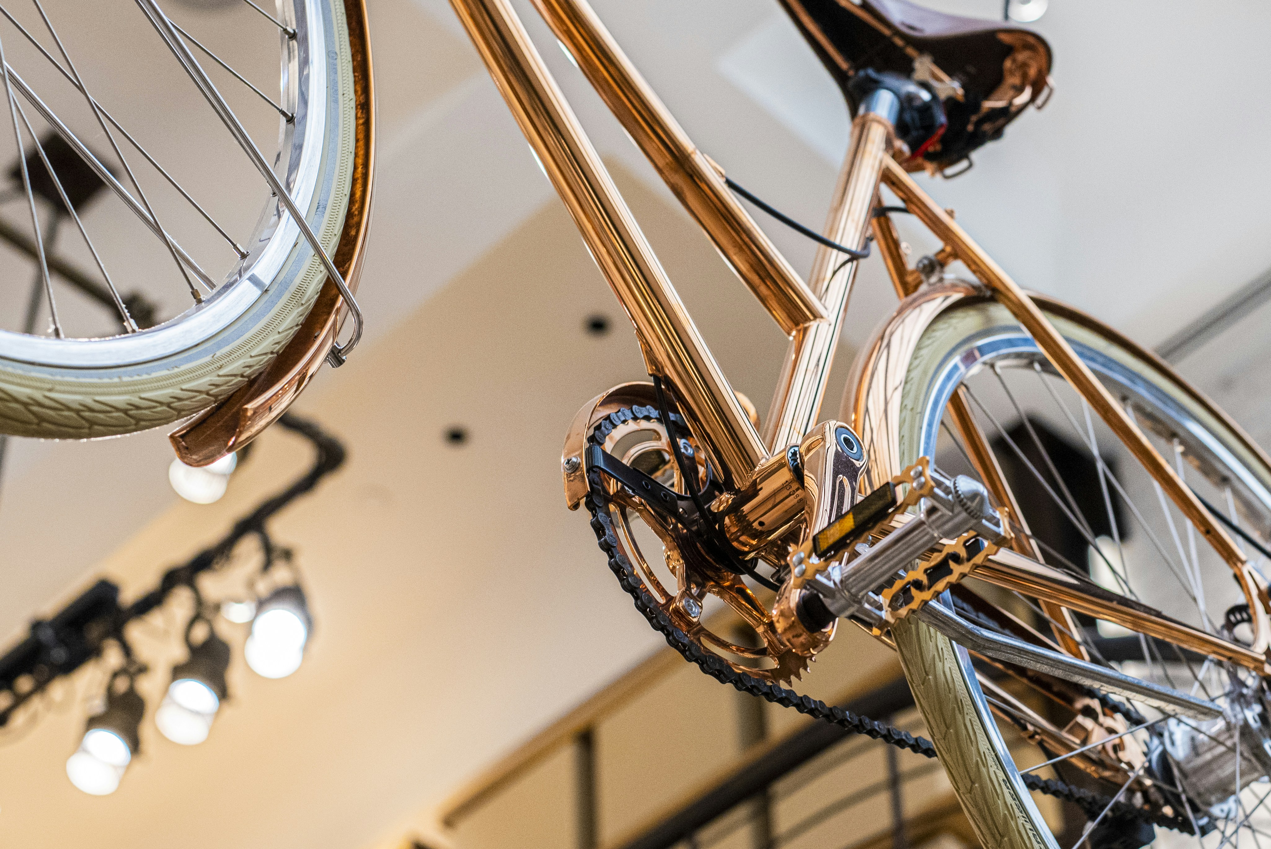 Luxury black and gold interior with Shinola bike display