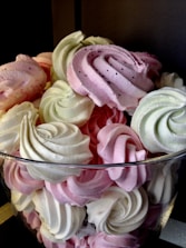 An assortment of colorful and fluffy meringues.