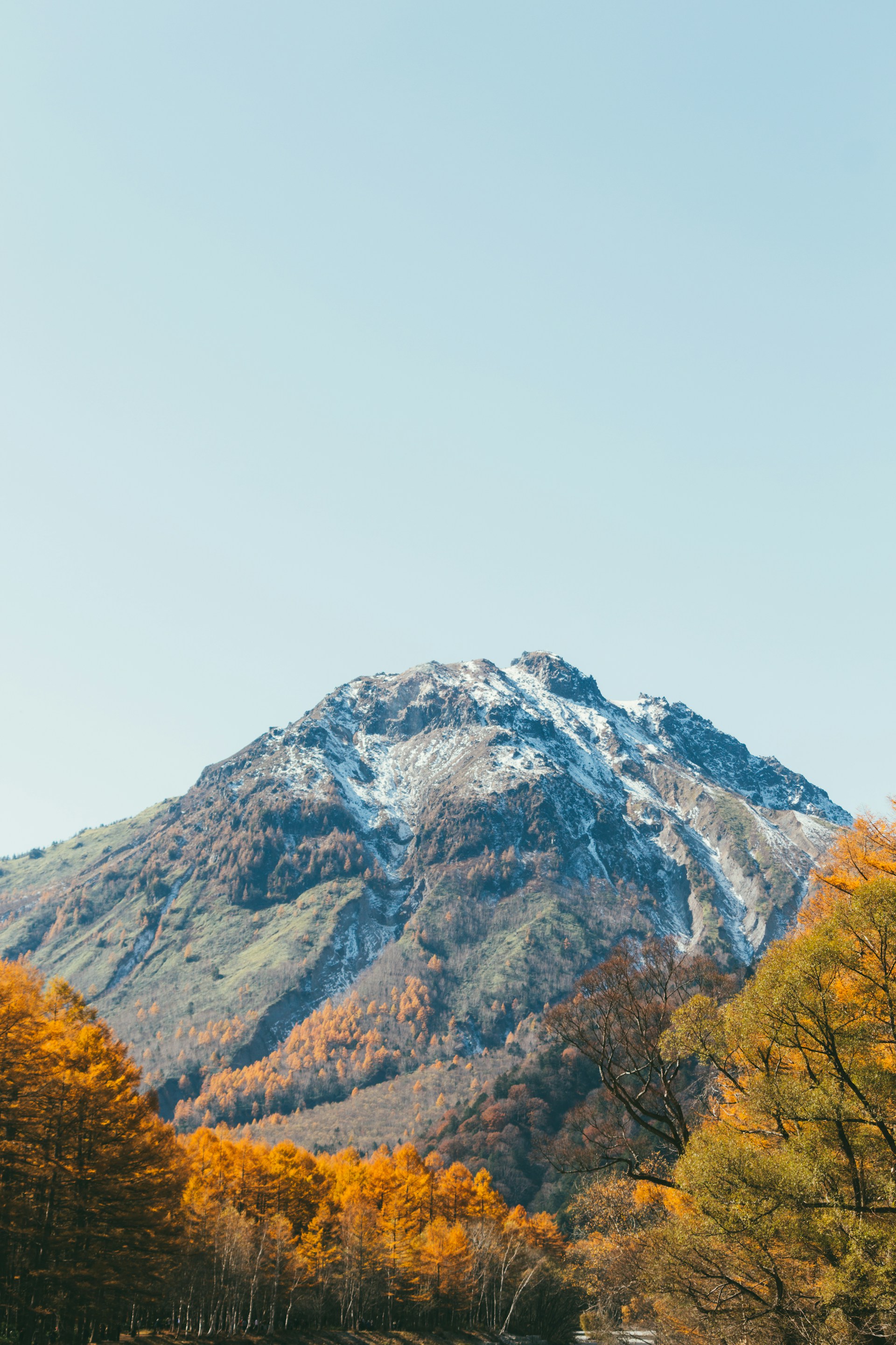 snow covered mountain during daytime
