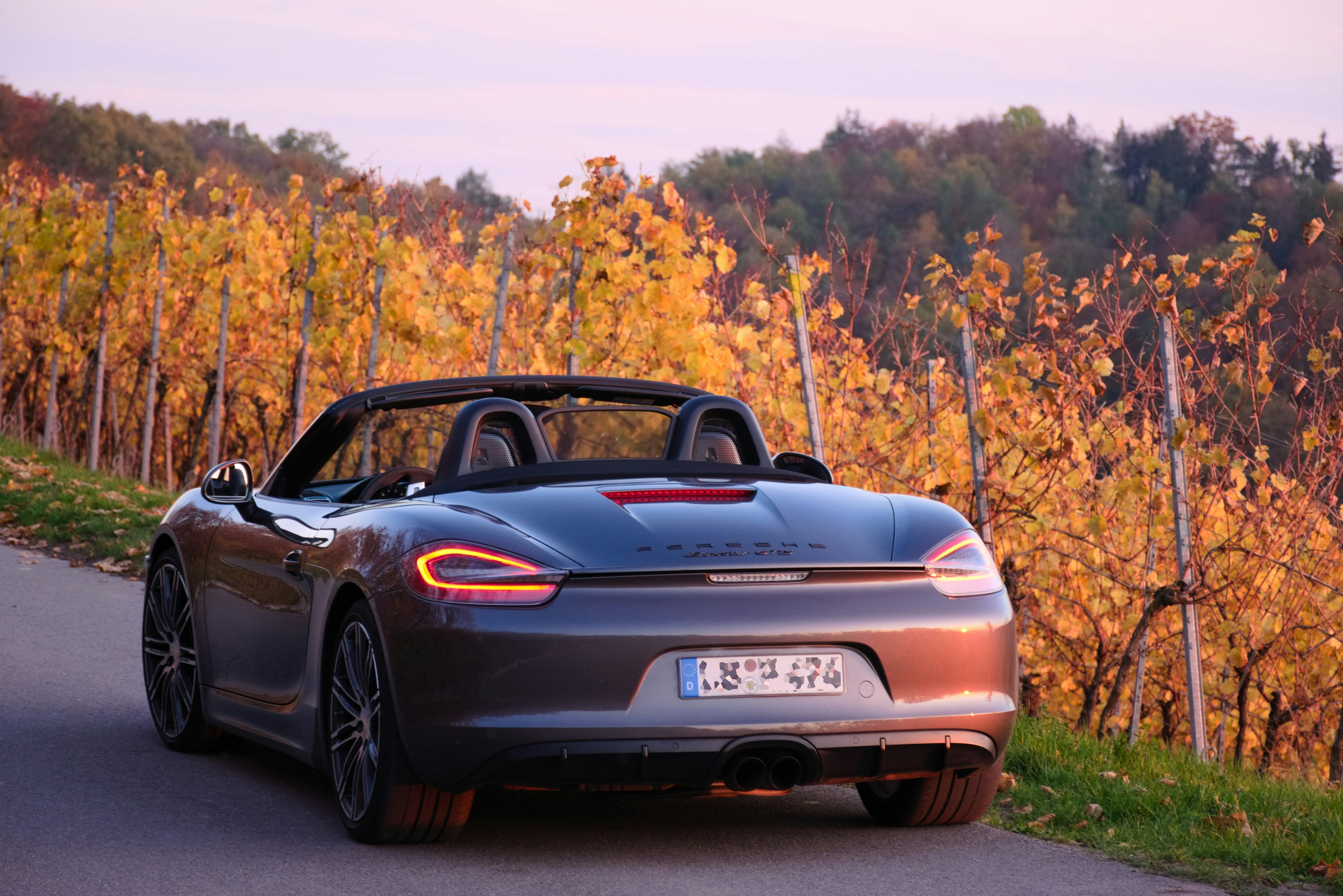 black porsche 911 on road during daytime