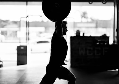 Silhouette of an athlete training at sunset