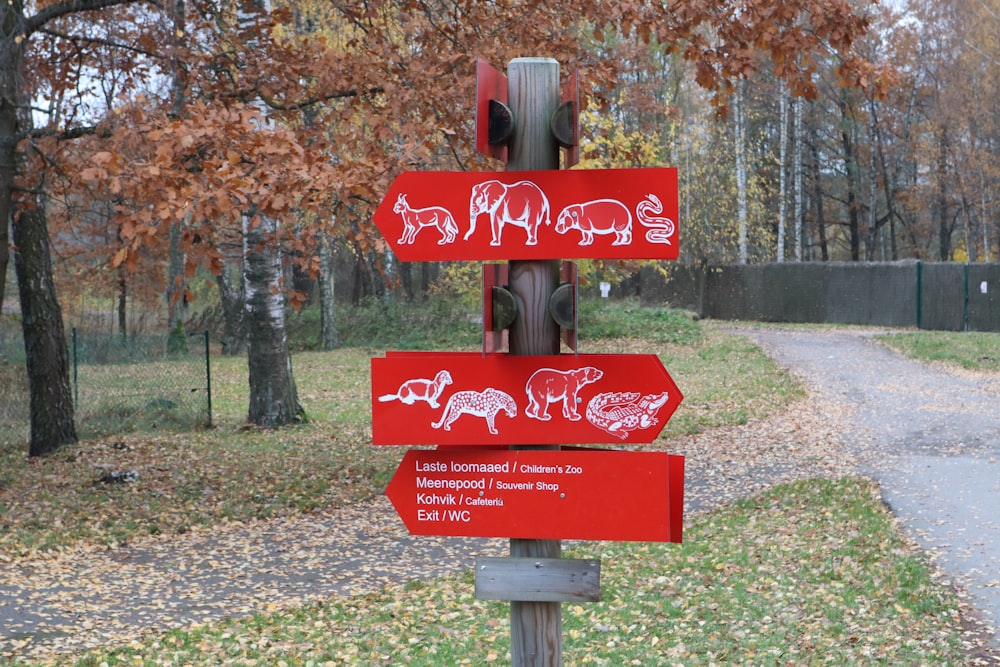 red and white wooden signage