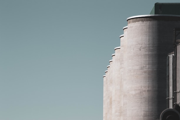 brown concrete building under blue sky during daytime