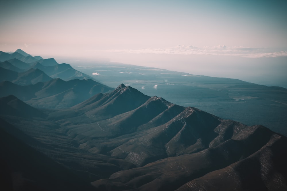 black and white mountains under white sky during daytime