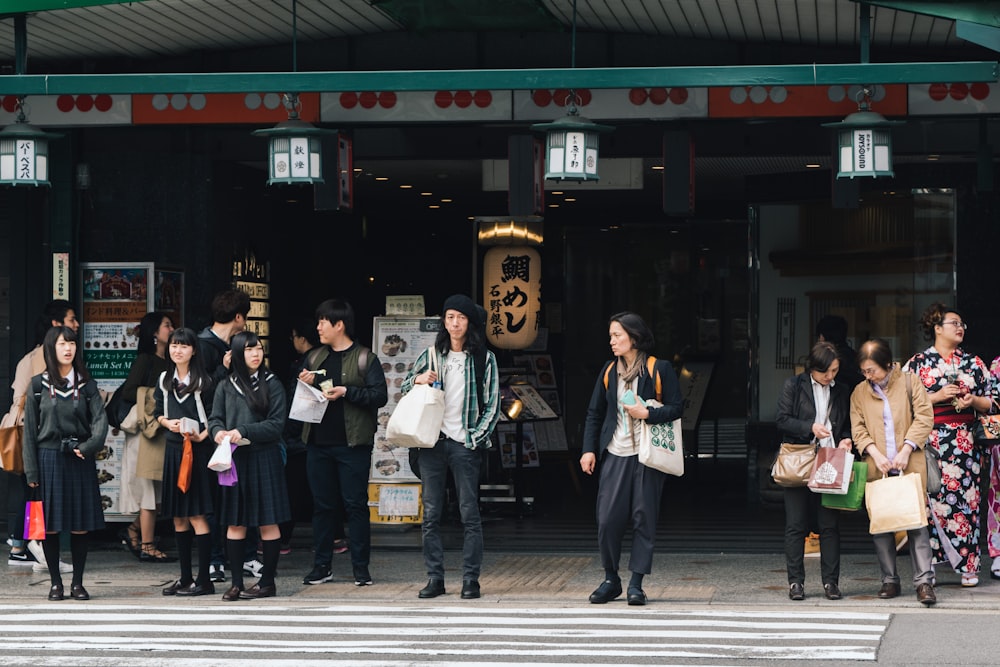 people standing in front of store during daytime