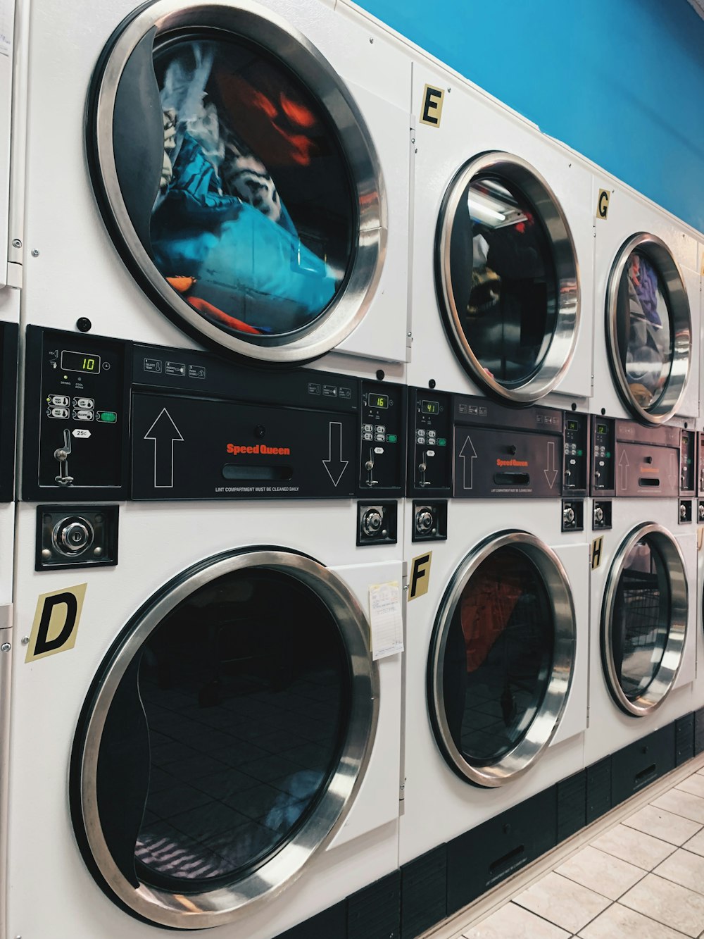 white and black front load washing machine