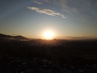 A picturesque sunset over a mountain range.