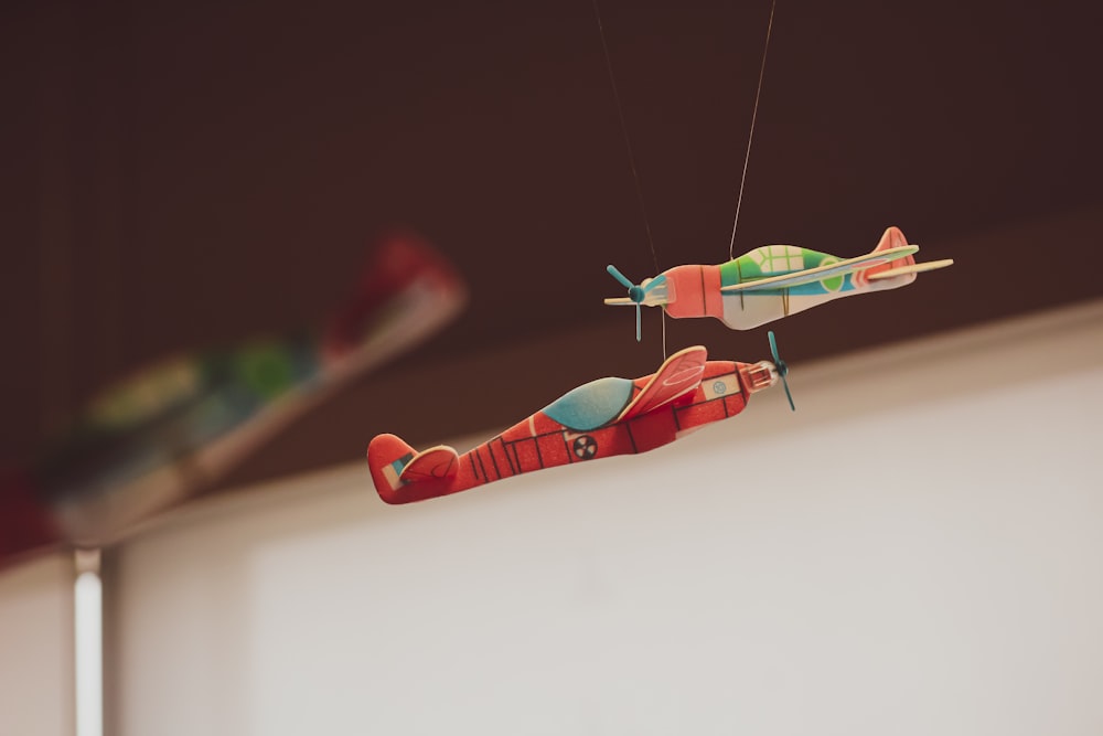 red and green plane toy