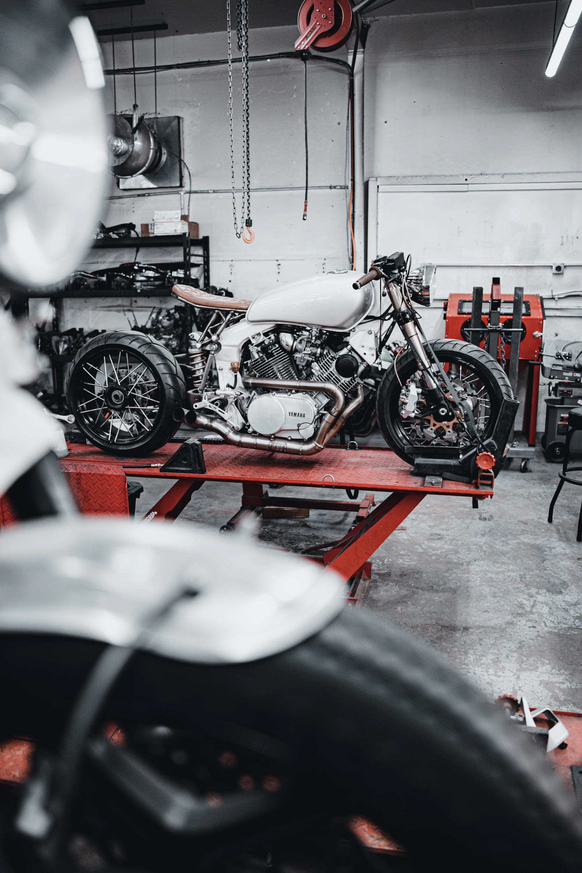 Premium motorcycle in a professional service workshop
