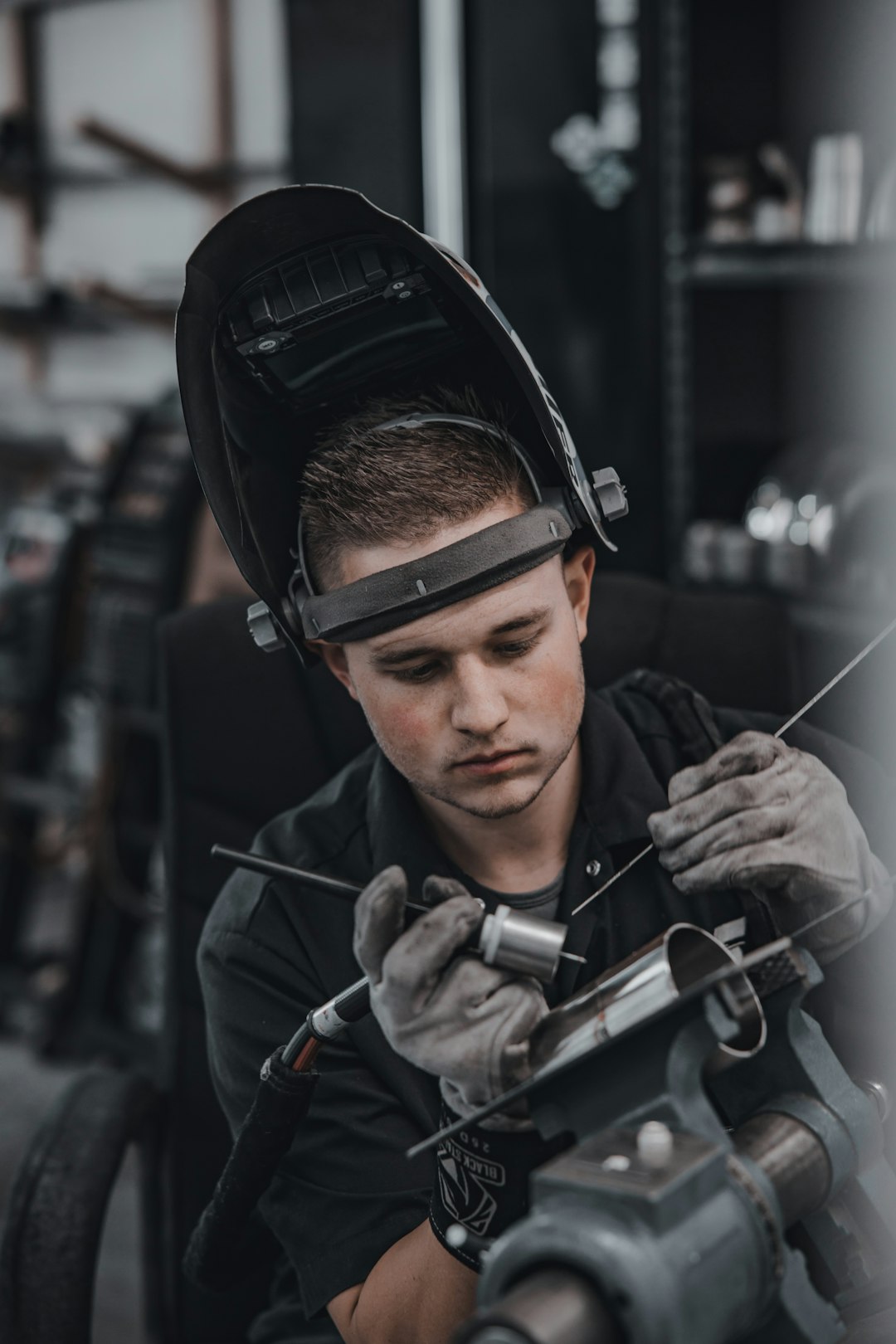 man in black headphones and black headphones