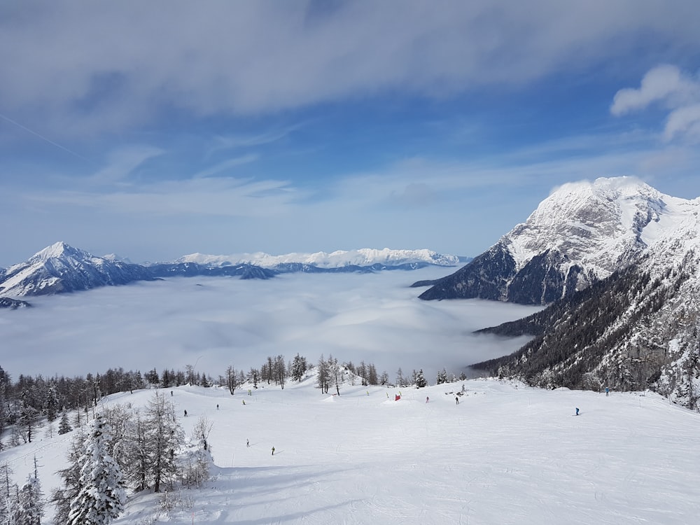 snow covered mountain under blue sky during daytime