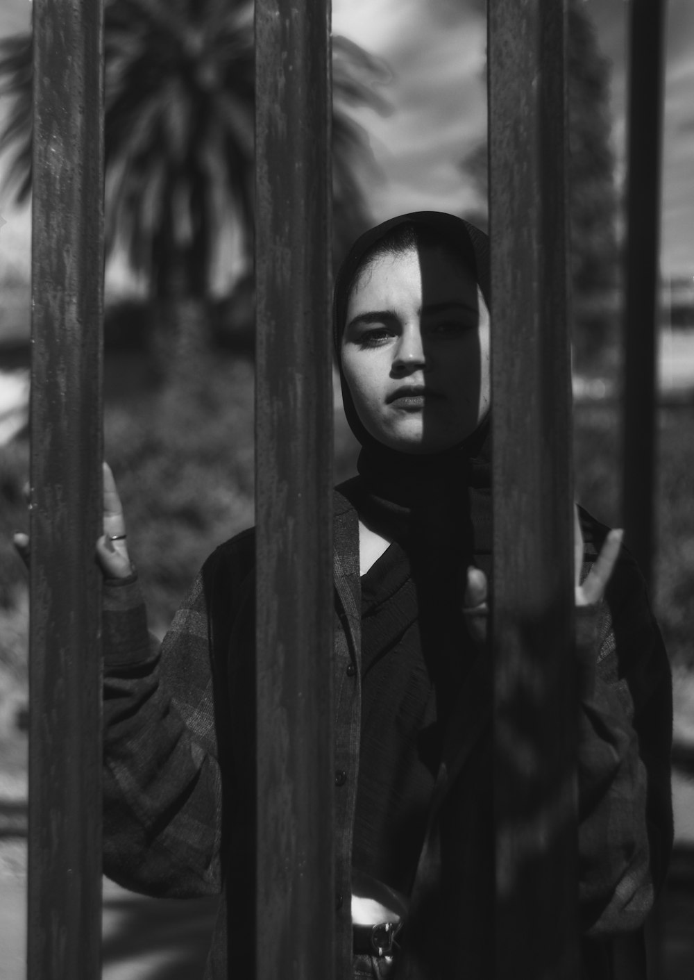 grayscale photo of woman in black jacket