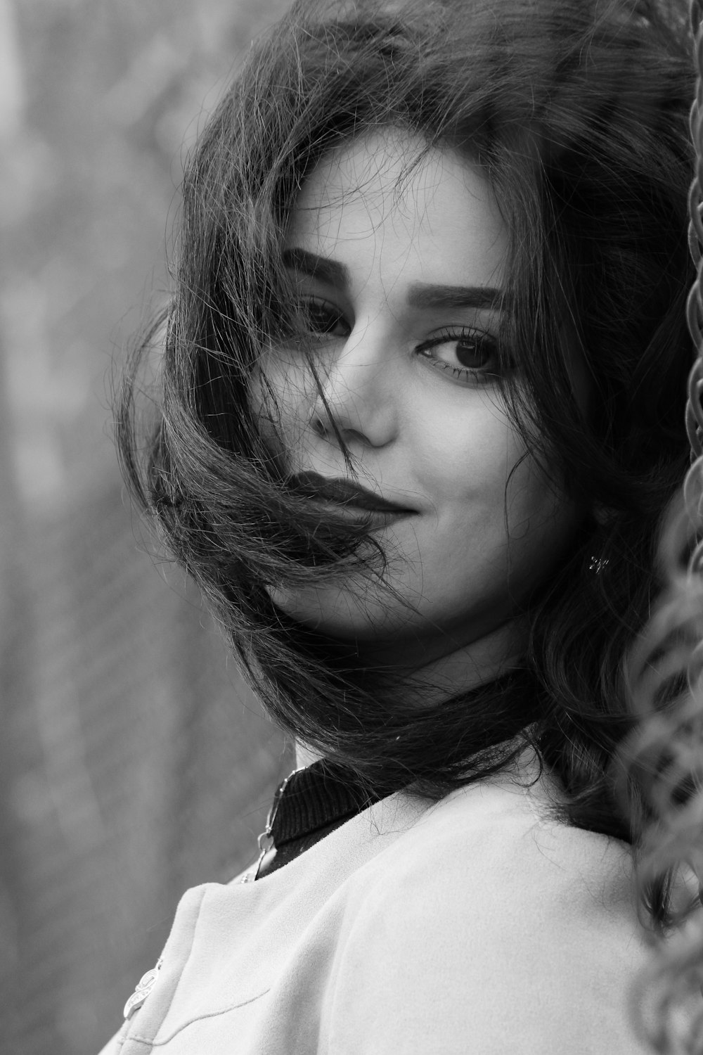 grayscale photo of girl in white shirt