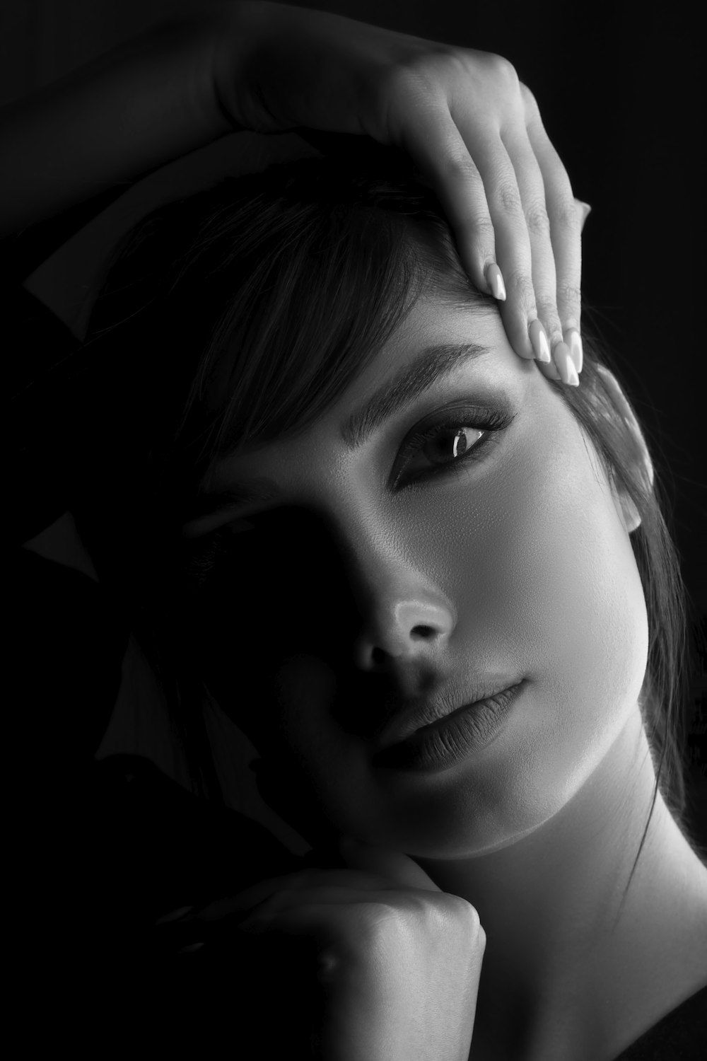 grayscale photo of womans face