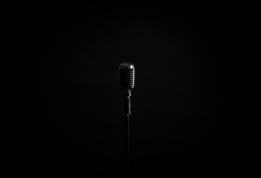 black microphone on black background