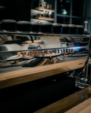 A sleek automated coffee kiosk showcasing advanced robotic technology.
