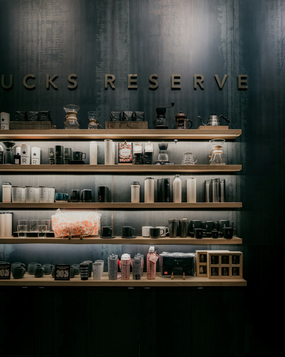 brown wooden shelf with bottles