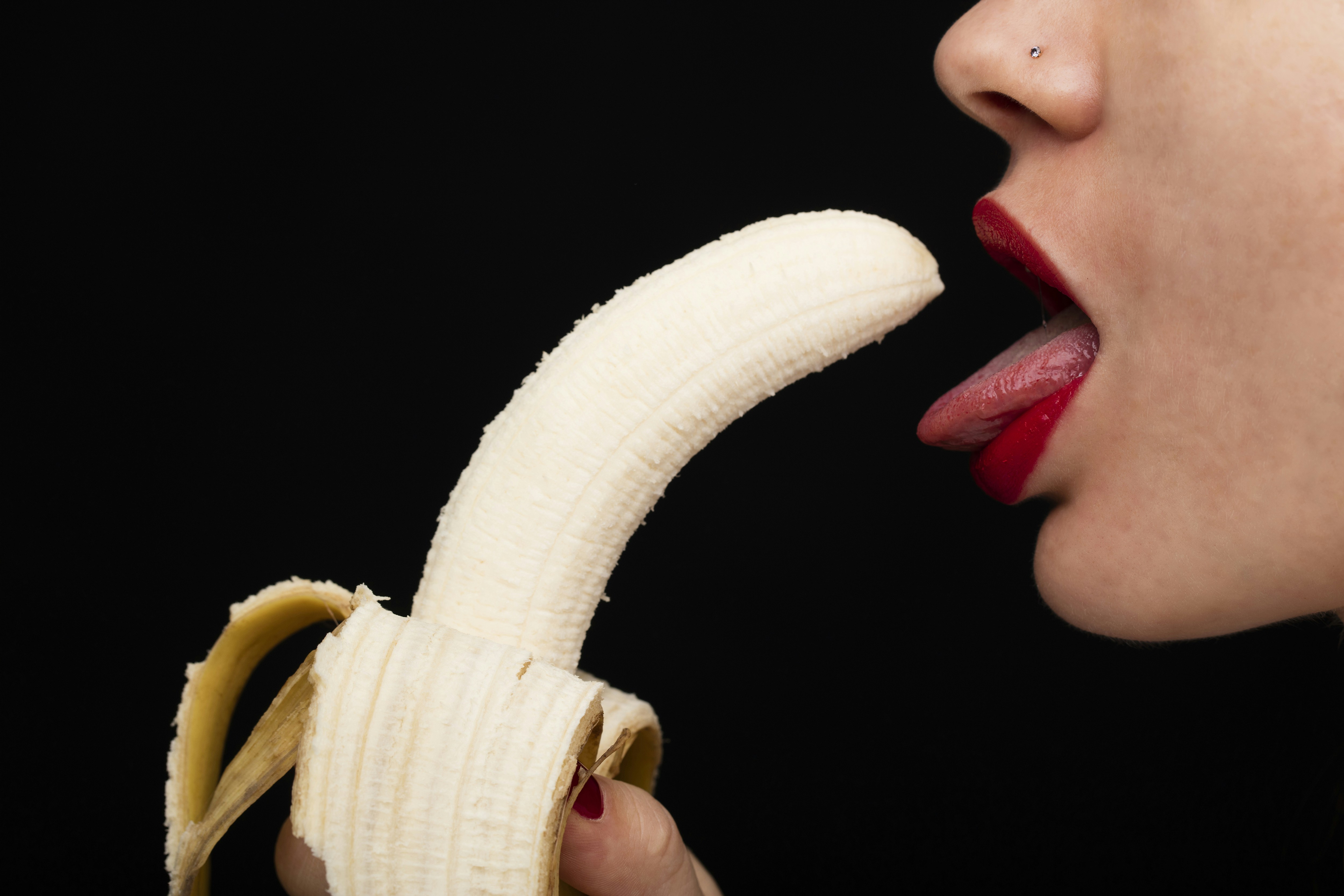 mouth eating banana