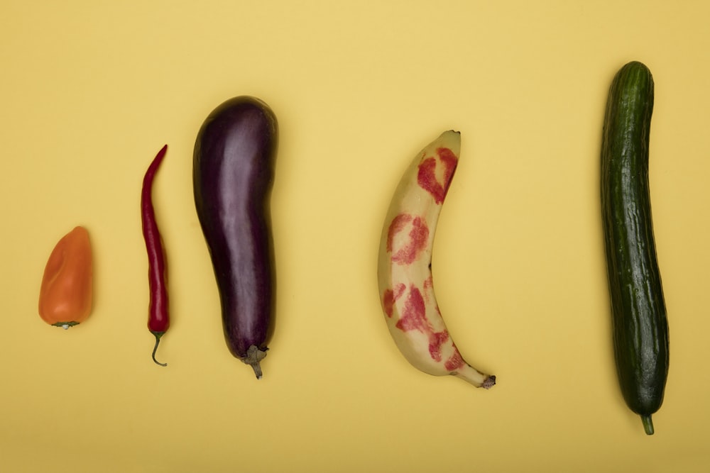 purple and white vegetable on yellow surface