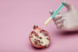 person holding green and white pen