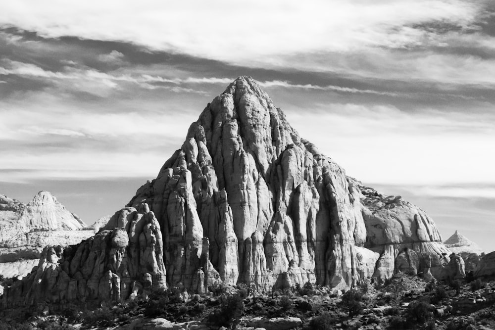 grayscale photo of rock formation