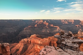 brown rock formation under blue sky during daytime