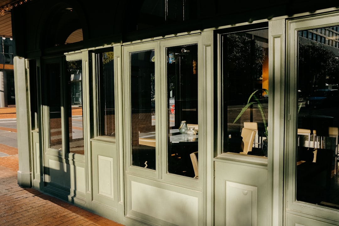 black wooden framed glass door