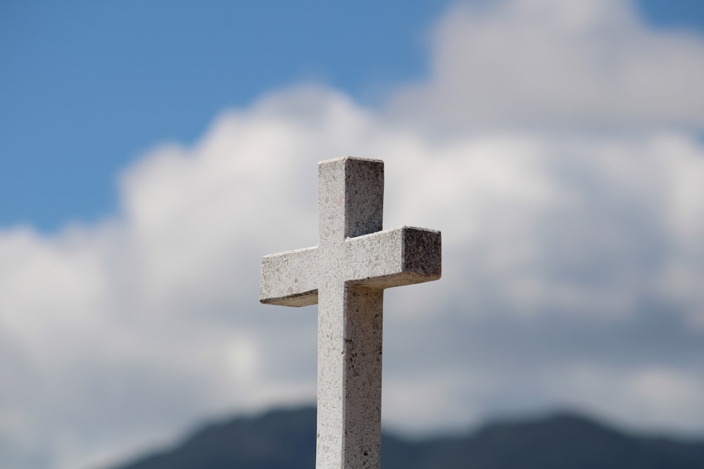 white cross under blue sky during daytime