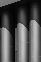 Close-up of a sleek navy and gold hexagonal column symbolizing structured tax strategy.