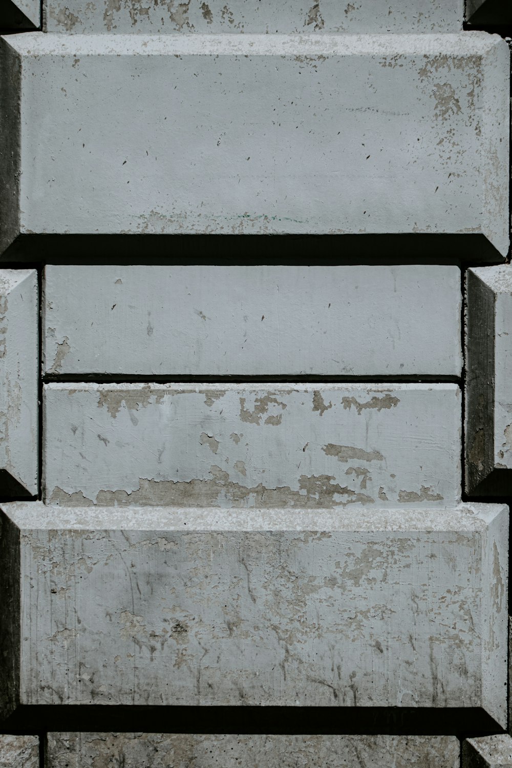 gray concrete wall with white paint