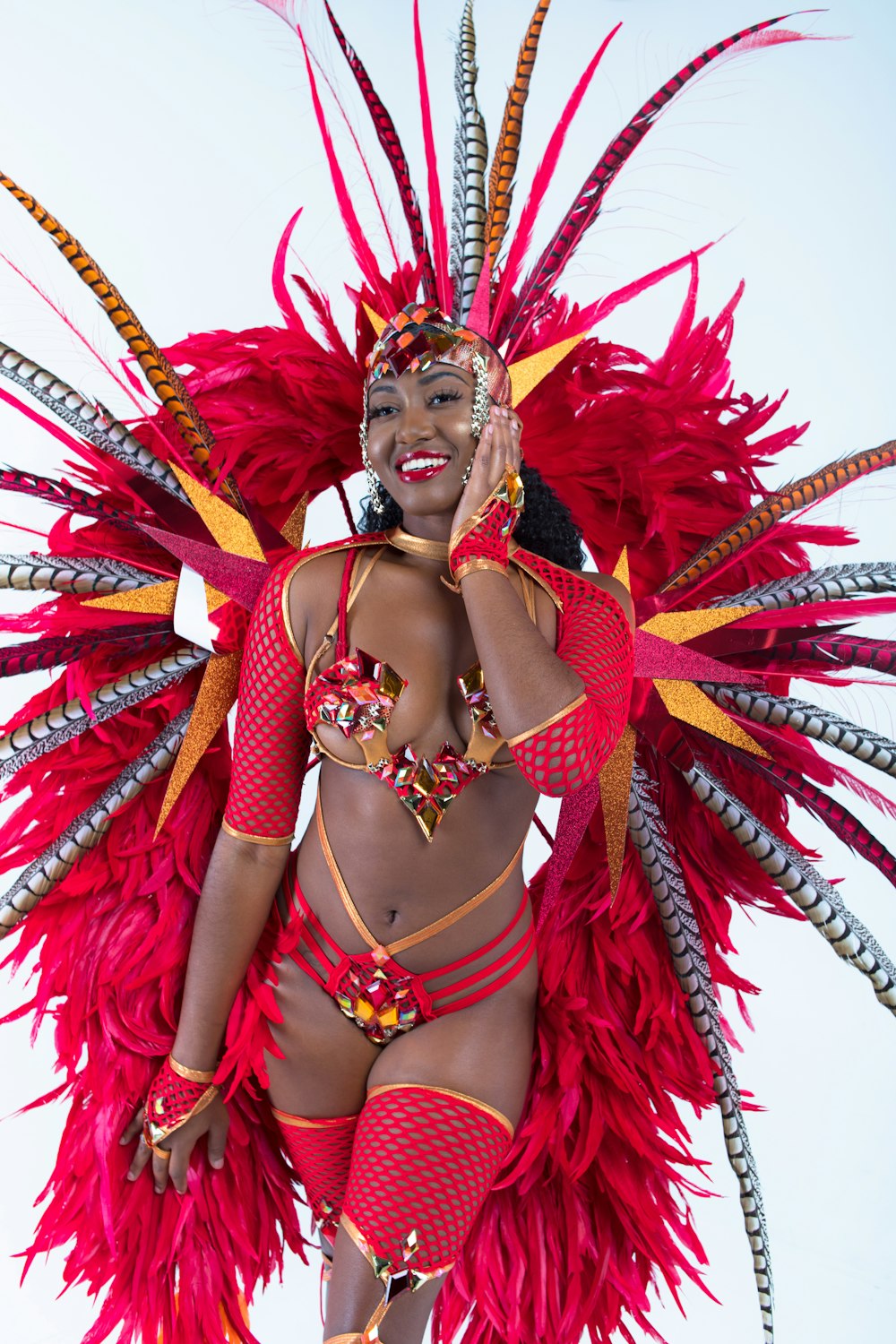 woman in red and gold costume