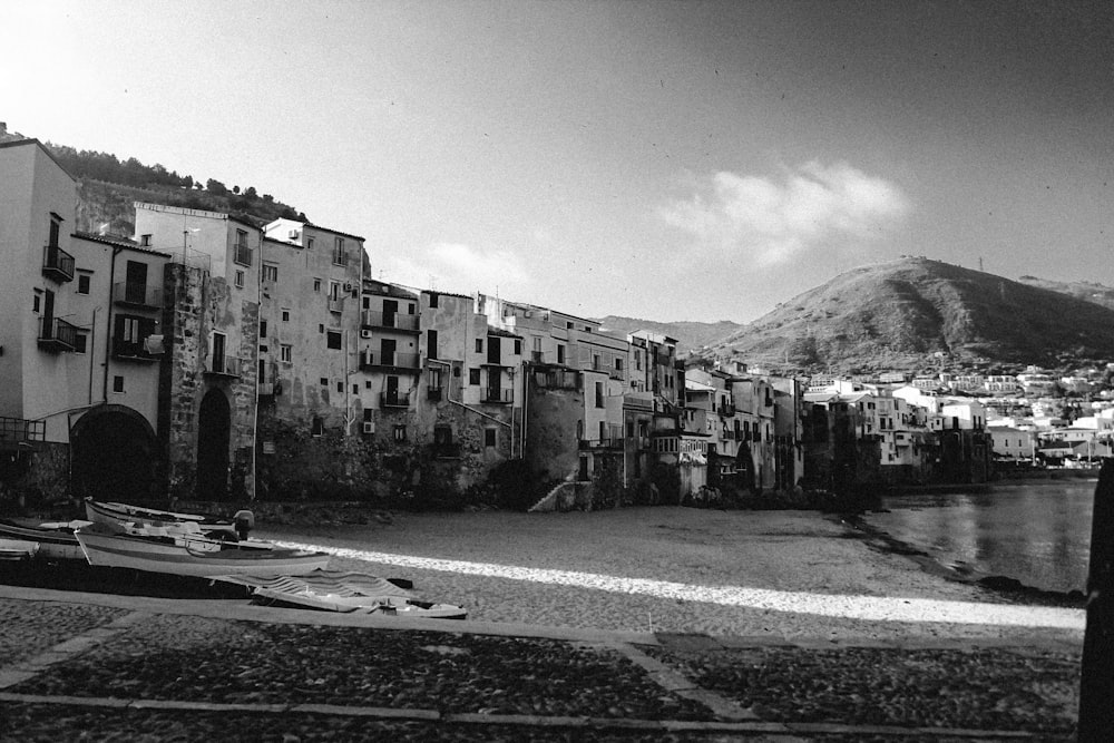 grayscale photo of city buildings