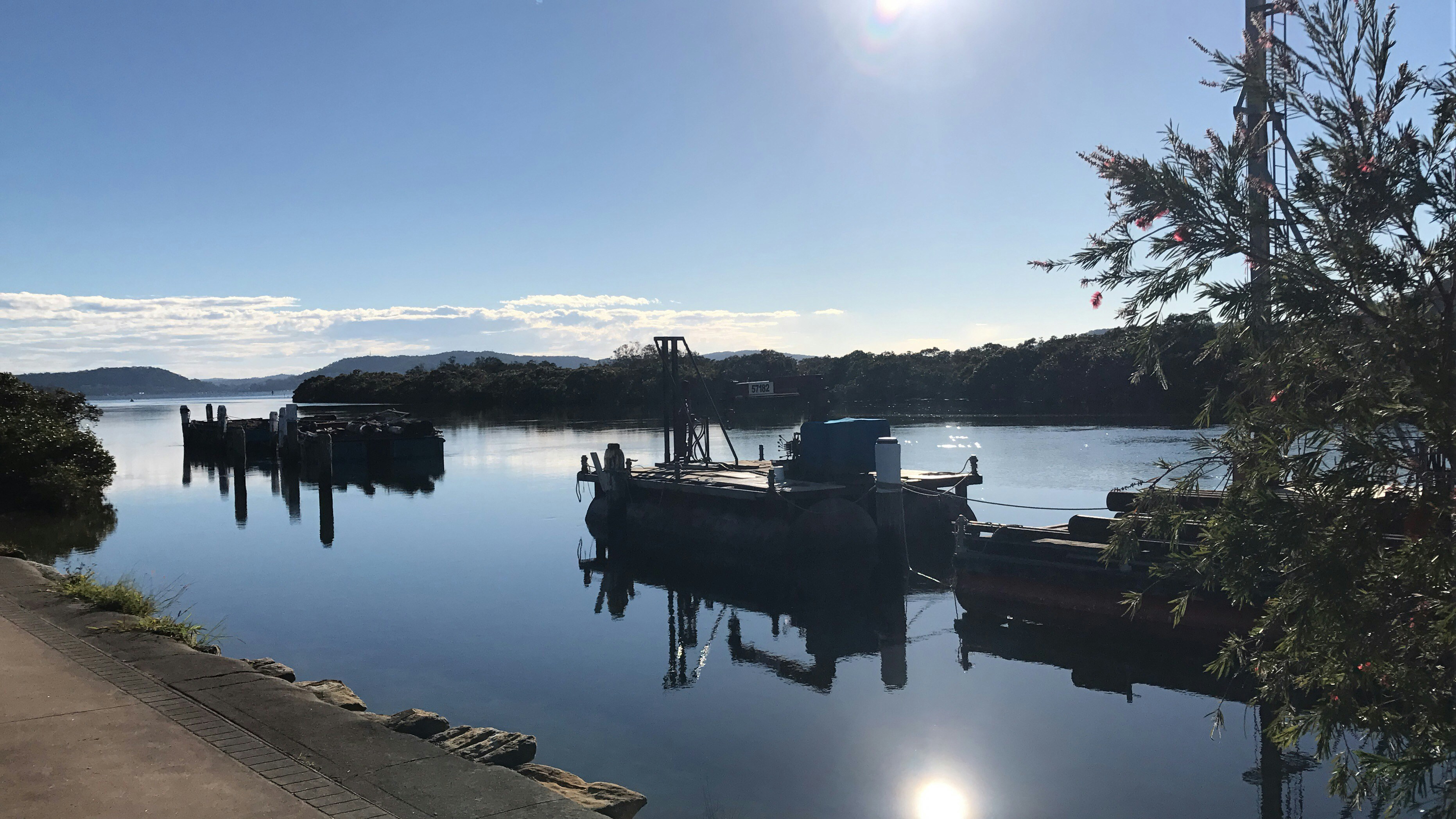 silhouette of people riding on horse on lake during daytime