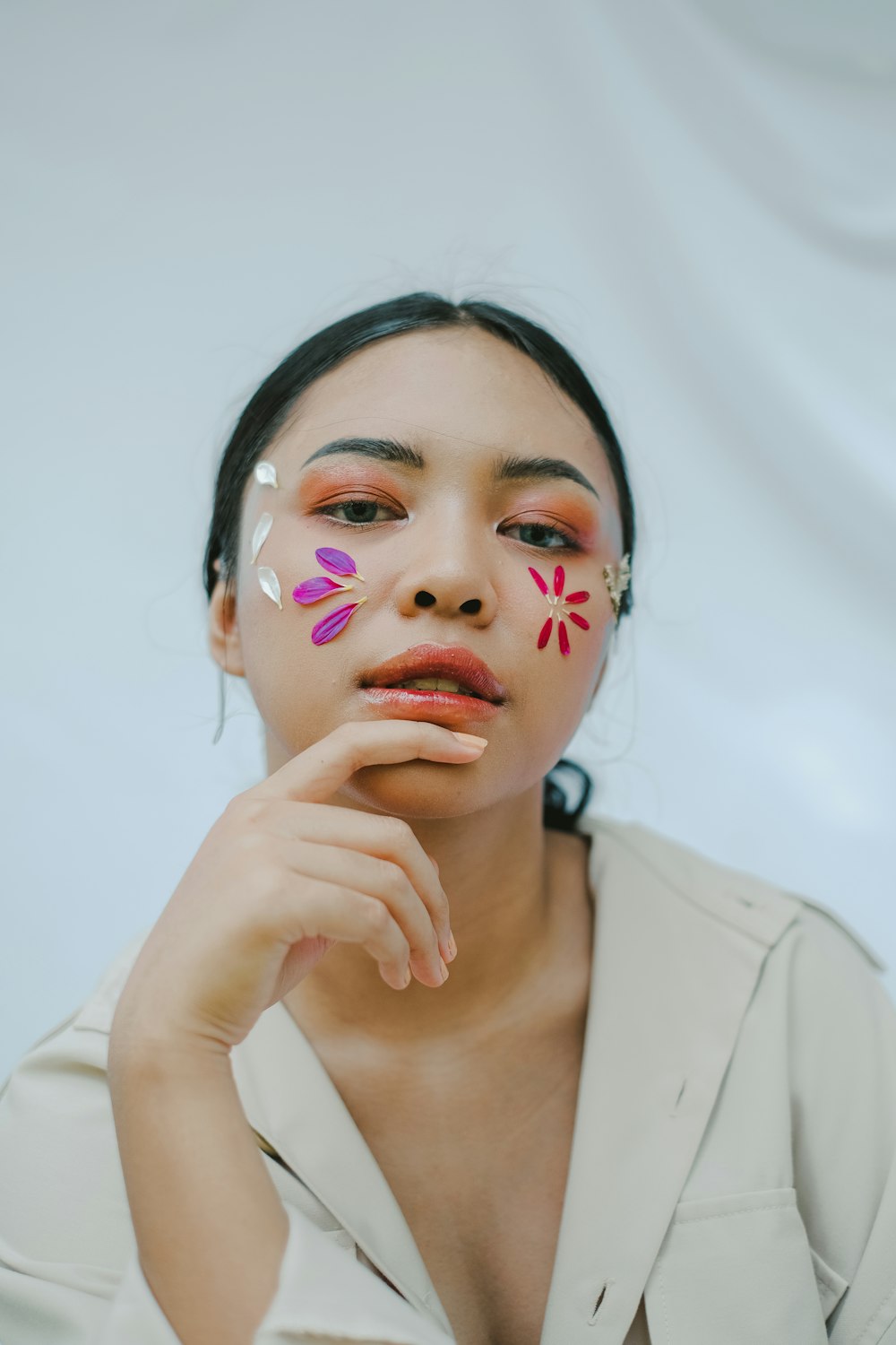 woman in white button up shirt with red lipstick