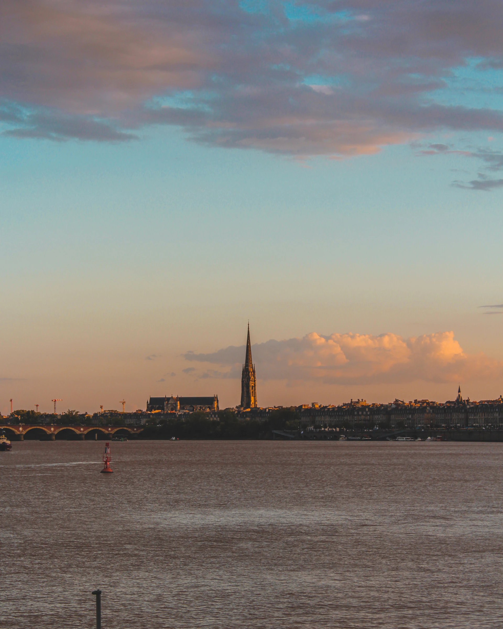 silhouette of city buildings during sunset