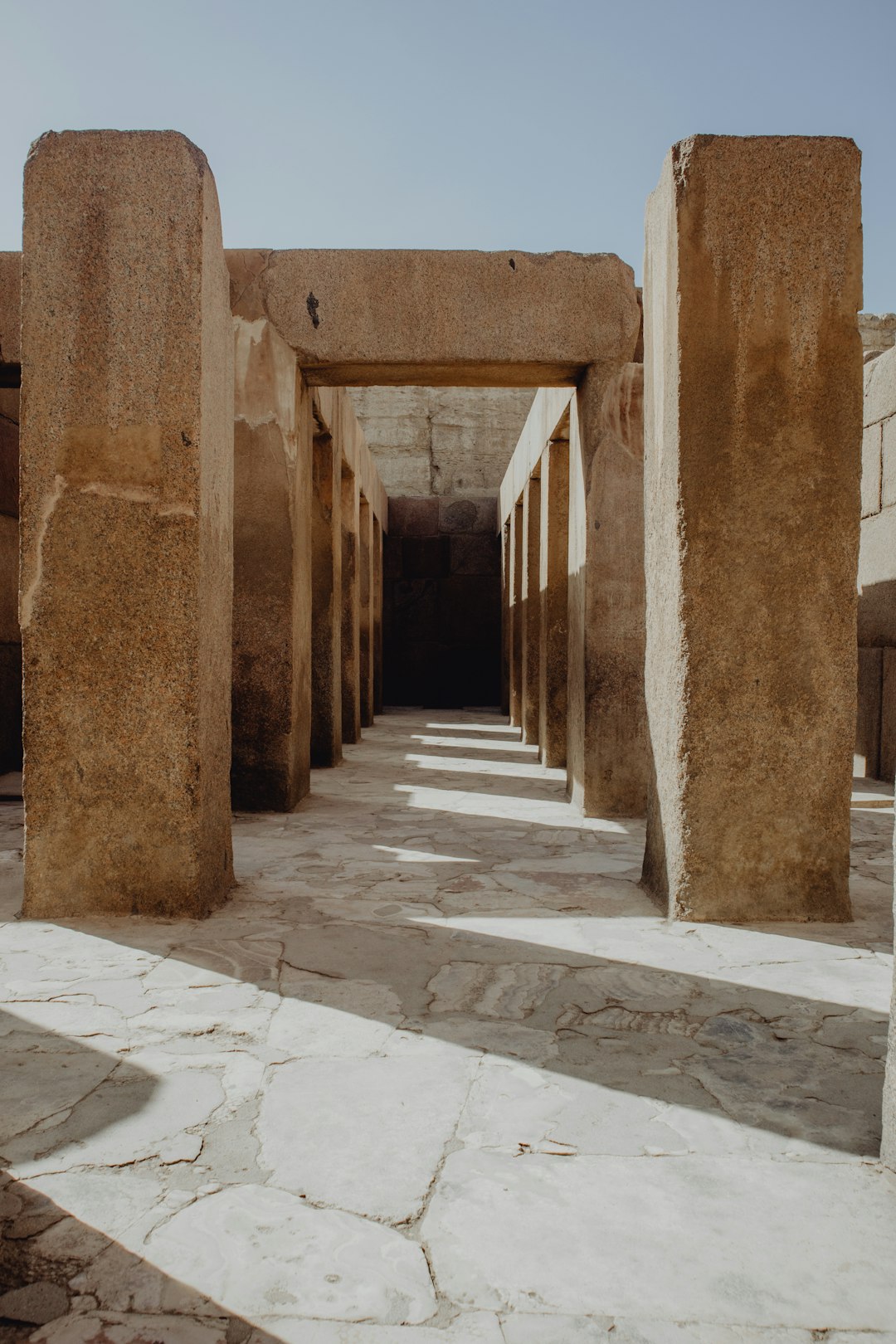 brown concrete hallway during daytime