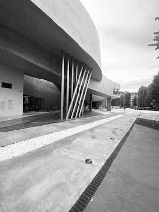 Monolithic concrete form as a centerpiece in an upscale residential project.