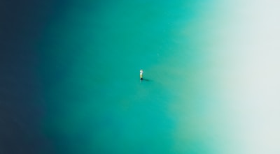 white boat on blue water