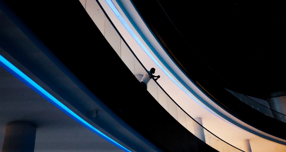 white and black tunnel with blue lights