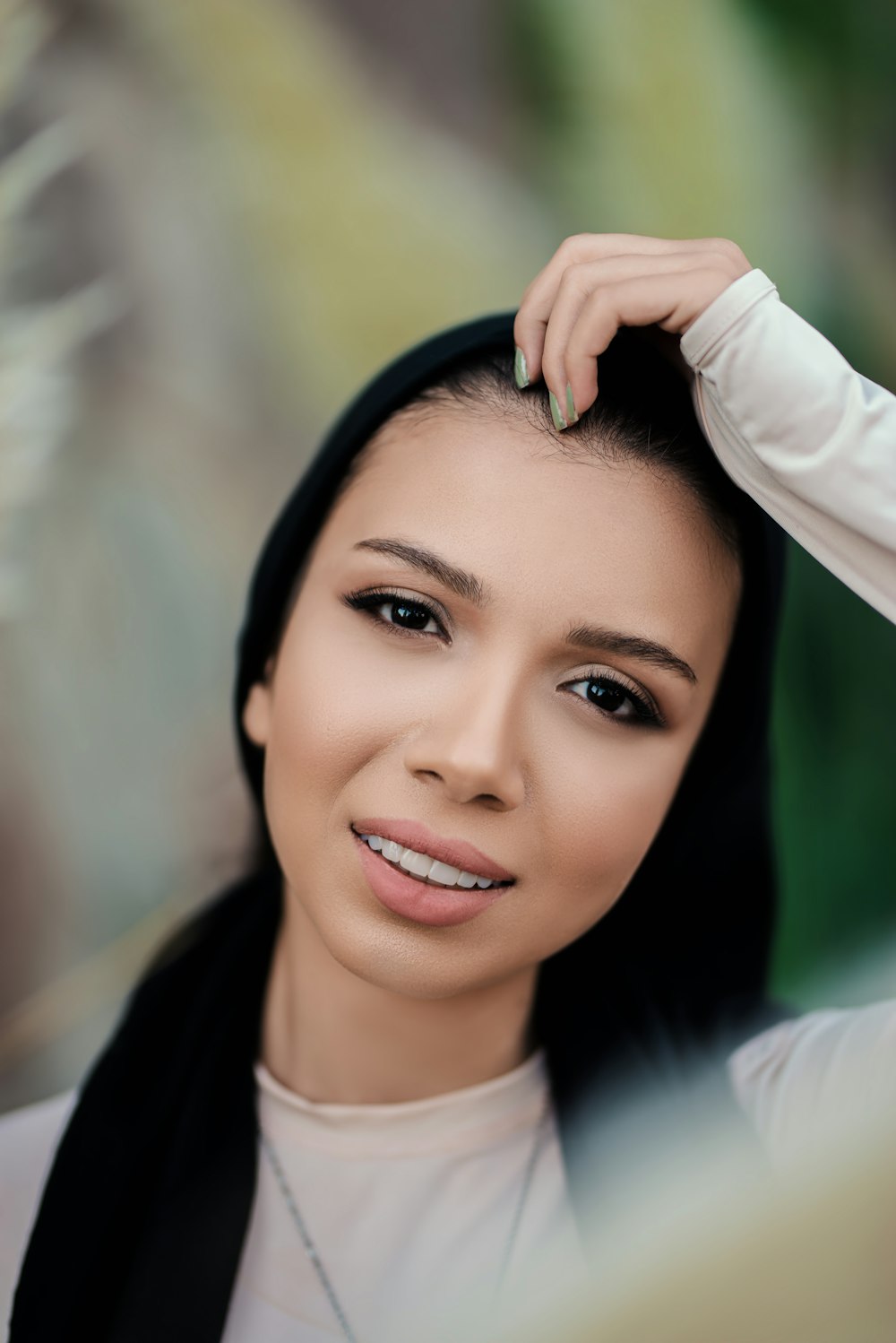 woman in white long sleeve shirt