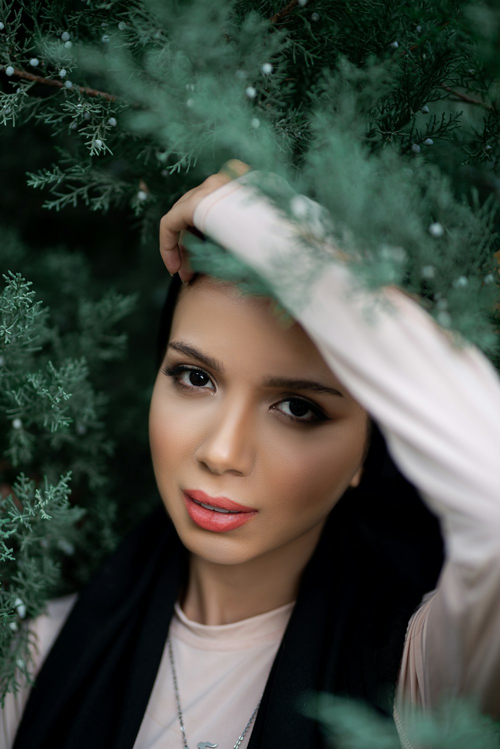 woman in white hijab and black shirt