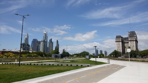 Before and after shots of a revitalized downtown area with lively streets and green spaces.