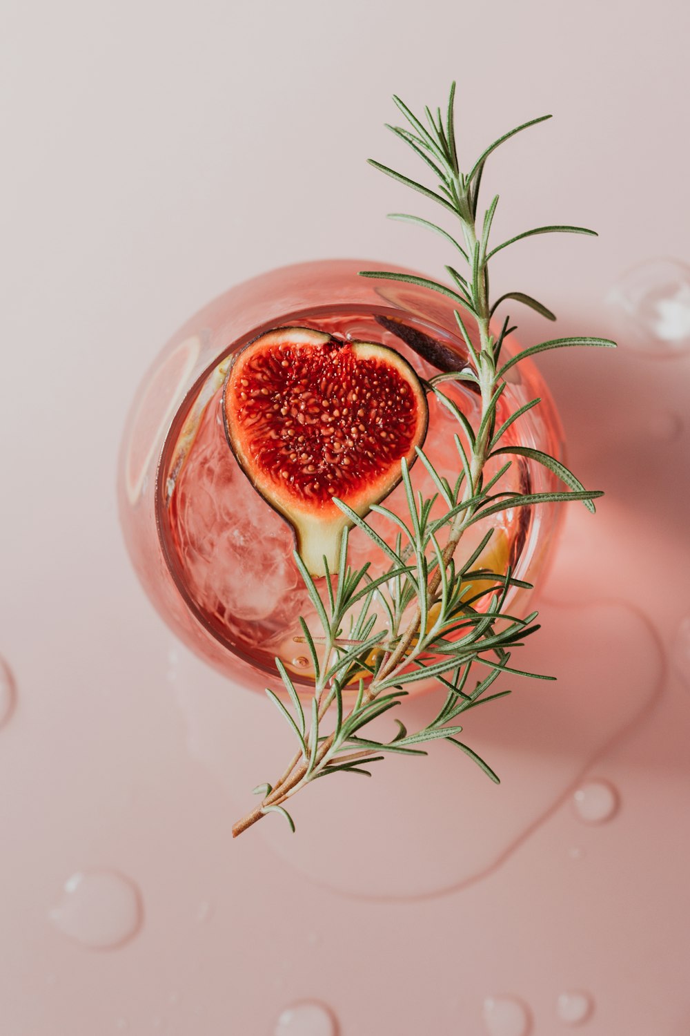 red fruit in clear glass bowl