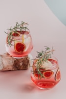red liquid in clear drinking glass