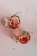 red and white garlic on white surface